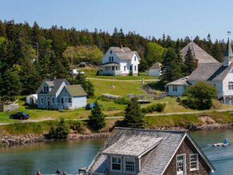 Frenchboro harbor with buildings on each side