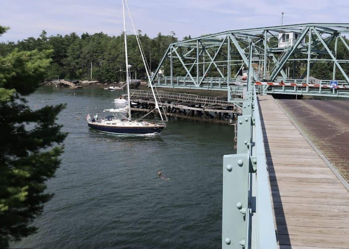 Swing bridge with sailboat approaching