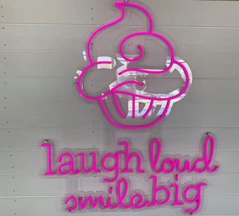 Laugh Loud Smile Big neon sign