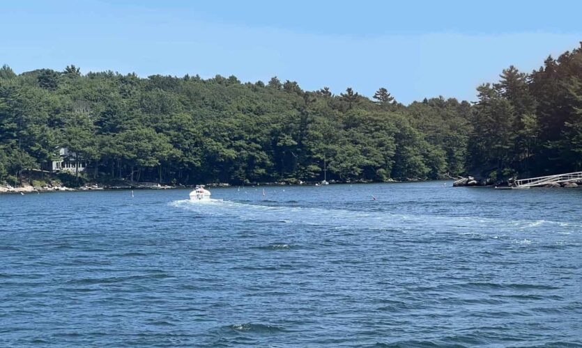 entrance to the Basin, with a power boat heading in