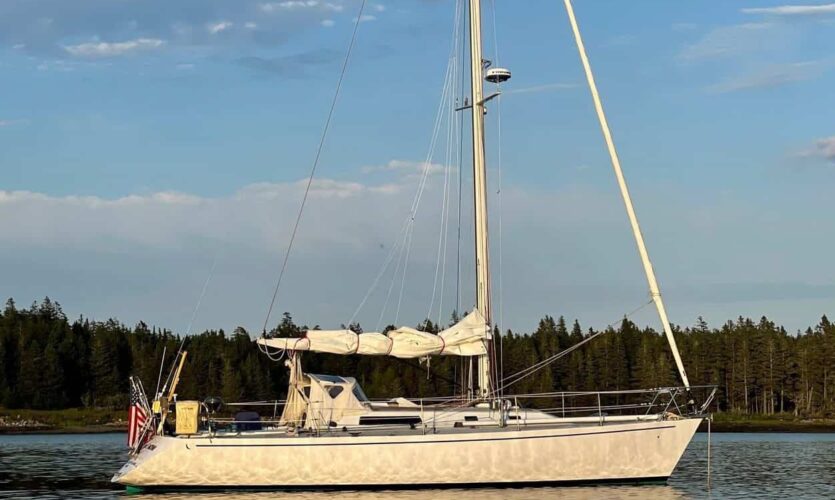 s/v Here And Now, owned by author Sandy Andrews, anchored on a sunny day