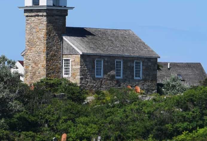 Isles of Shoals Chapel, a stone building with a square bell tower.