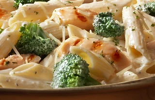 Creamy pasta with lobster and broccoli