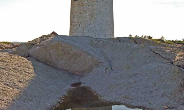 Mistake Island - Moose Peak Light reflected in a pool of water